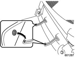 Retaining pins are located on the driver’s side floor.