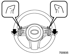 Pull the “+” of the paddle shift to upshift one level. Also pull the “−” of the